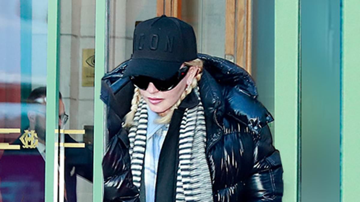 alert-–-madonna,-65,-cuts-a-casual-figure-as-she-layers-up-after-another-successful-night-on-her-celebration-tour-in-stockholm