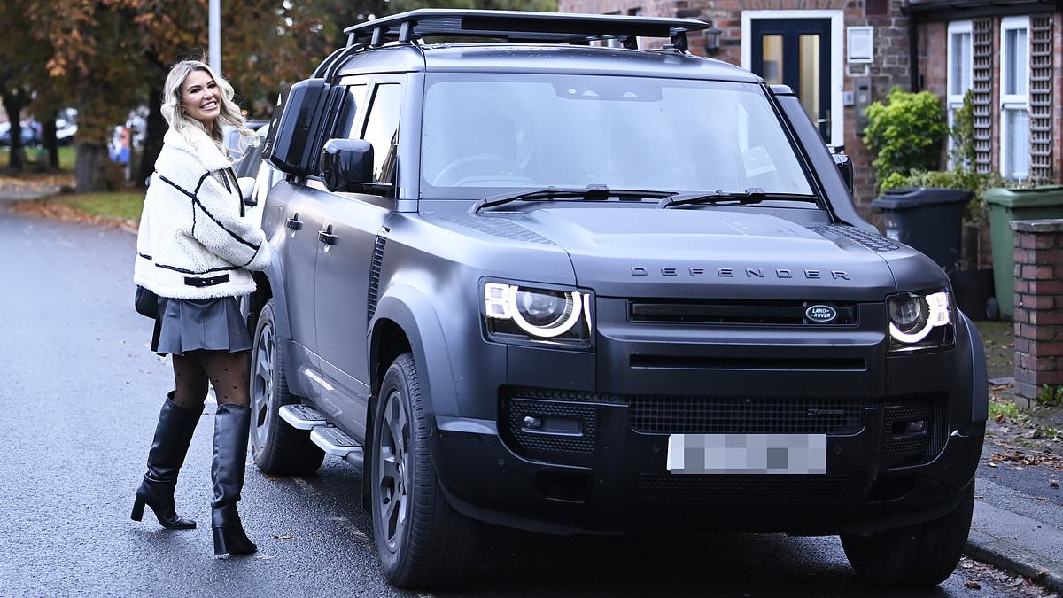 alert-–-christine-mcguinness-puts-on-a-leggy-display-in-a-mini-skirt-and-faux-fur-coat-as-she-shows-off-her-new-120,000-land-rover-defender-in-cheshire