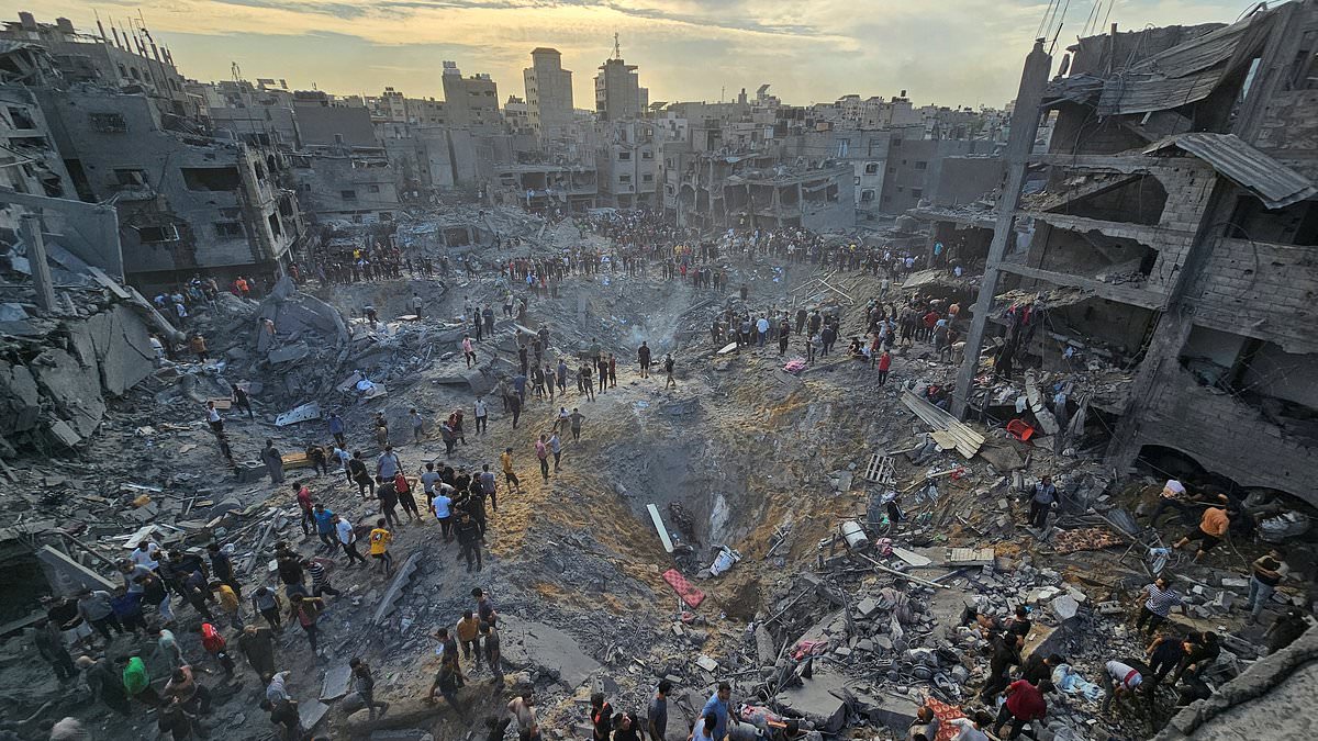 alert-–-israel-say-they-carried-out-airstrike-that-hamas-claim-killed-more-than-50-people-at-gaza’s-jabalia-refugee-camp:-‘dozens-of-bodies’-are-recovered-after-site-is-reduced-to-giant-crater-–-idf-claim-their-jets-took-out-senior-jihadi-commander