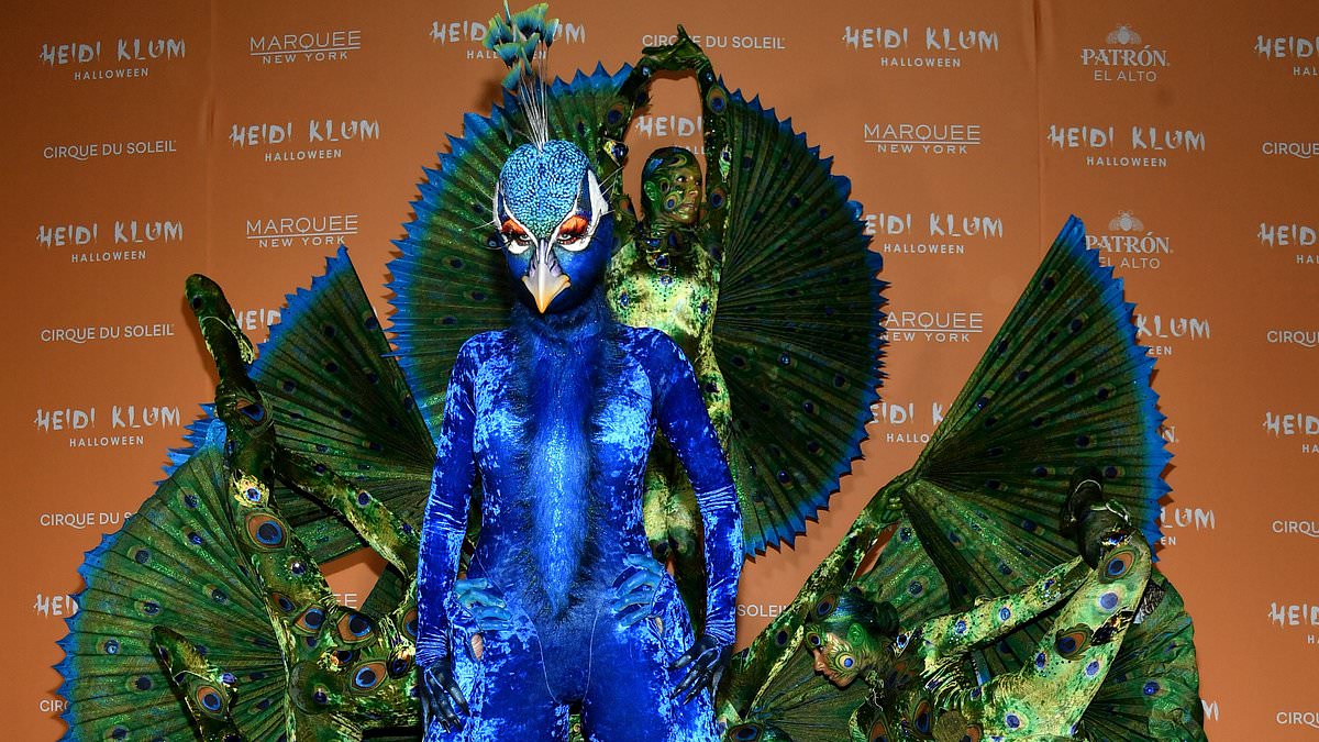 alert-–-as-heidi-klum-proves-she-is-the-queen-of-halloween-with-an-elaborate-peacock-costume…-a-look-back-at-the-star’s-most-bizarre-outfits-from-jessica-rabbit-look-to-that-worm-suit