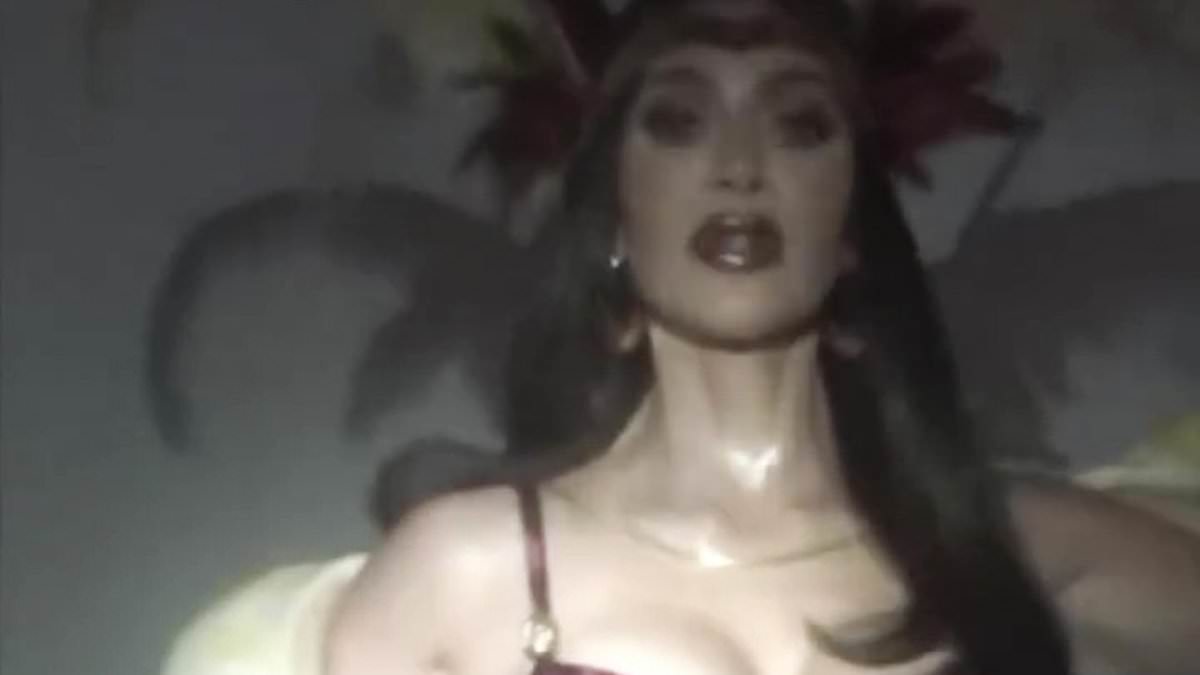 alert-–-kim-kardashian’s-most-daring-costume-yet!-reality-star,-43,-channels-that-very-sexy-salma-hayek-from-dusk-till-dawn-bikini-look-as-she-poses-with-python