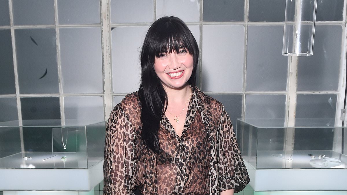 alert-–-daisy-lowe-cuts-a-chic-figure-in-a-sheer-leopard-print-blouse-and-flared-trousers-as-she-heads-to-a-jewellery-launch-bash