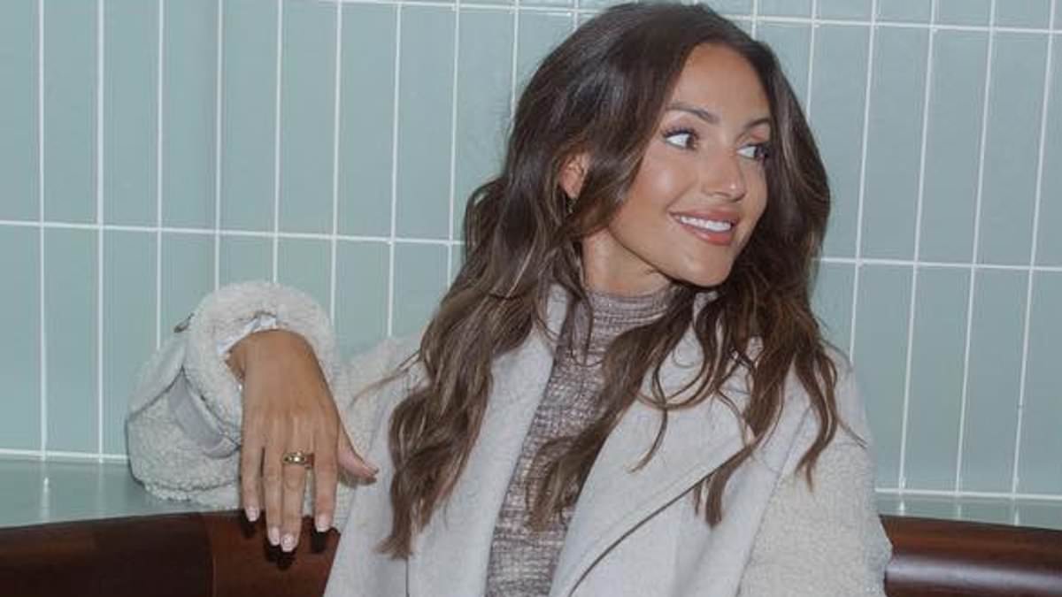 alert-–-michelle-keegan-displays-a-glimpse-of-her-toned-pins-in-a-grey-mini-dress-and-knee-high-boots-as-she-poses-for-sexy-shots-during-a-night-out