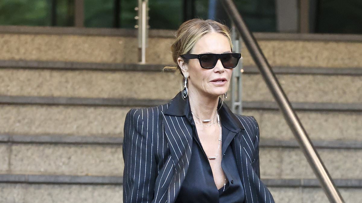 alert-–-elle-macpherson-shows-off-her-statuesque-figure-in-a-pinstripe-suit-as-she-leaves-channel-10-studios-in-sydney-–-after-sharing-her-thoughts-on-ageing-ahead-of-turning-60