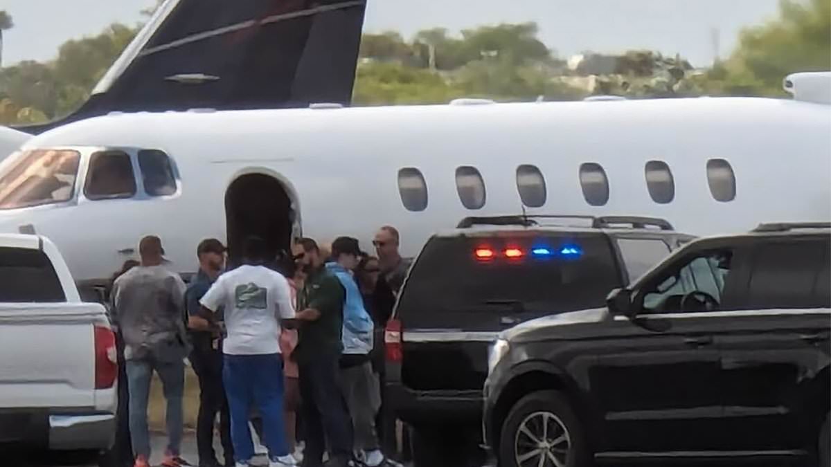 alert-–-diddy-is-seen-speaking-to-feds-on-tarmac-at-miami-airport-next-to-‘drug-mule’-now-in-custody-–-as-he-insists-he’s-innocent-and-victim-of-a-witch-hunt