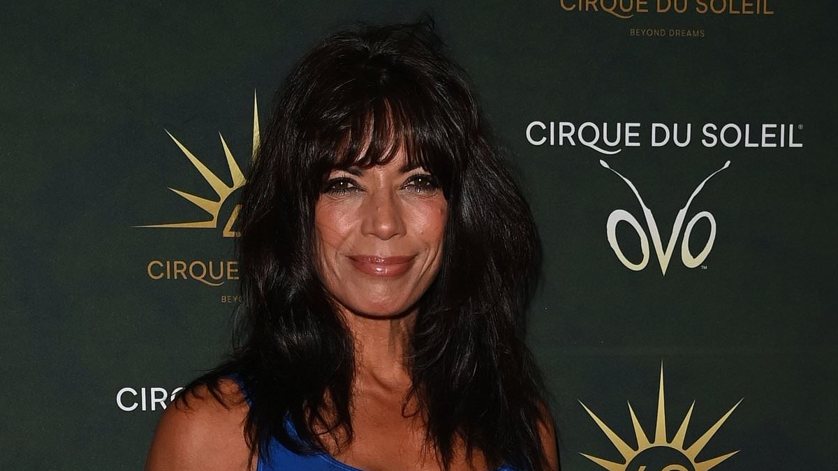 alert-–-age-defying-jenny-powell,-55,-looks-incredible-in-a-vibrant-blue-ensemble-as-she-steps-out-in-manchester-with-her-long-time-fiance-martin-lowe-for-the-cirque-du-soleil-uk-tour