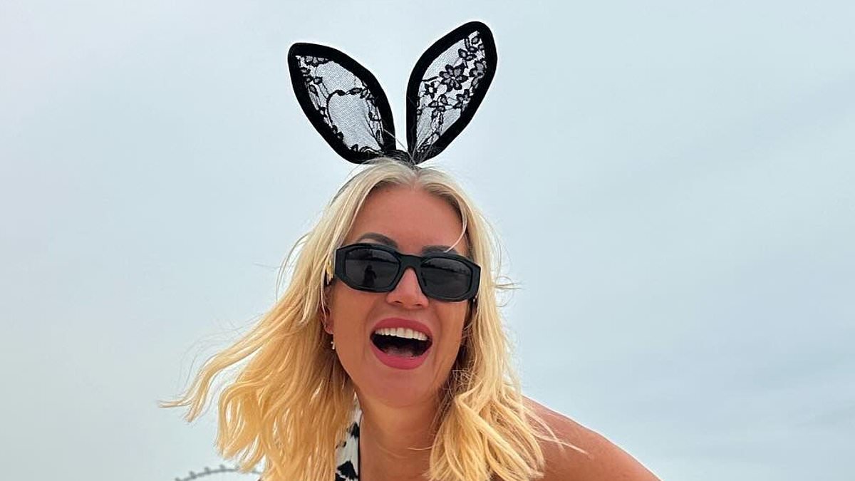 alert-–-denise-van-outen-puts-on-a-busty-display-in-plunging-animal-print-swimsuit-and-bunny-ears-as-she-celebrates-easter-on-beach-in-dubai
