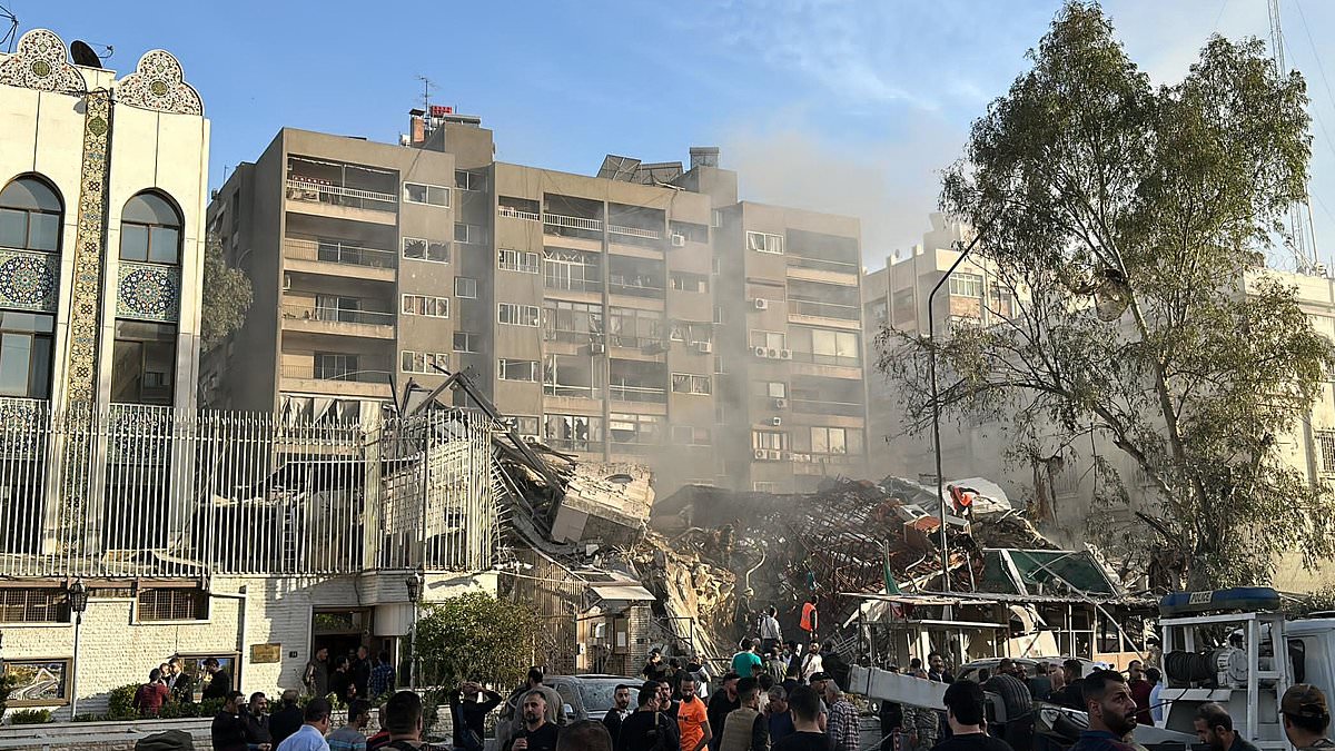 alert-–-iranian-military-leader-is-‘killed’-alongside-five-others-as-building-next-to-embassy-in-damascus-is-destroyed-in-missile-attack-–-as-state-media-accuses-israel-of-being-behind-airstrike