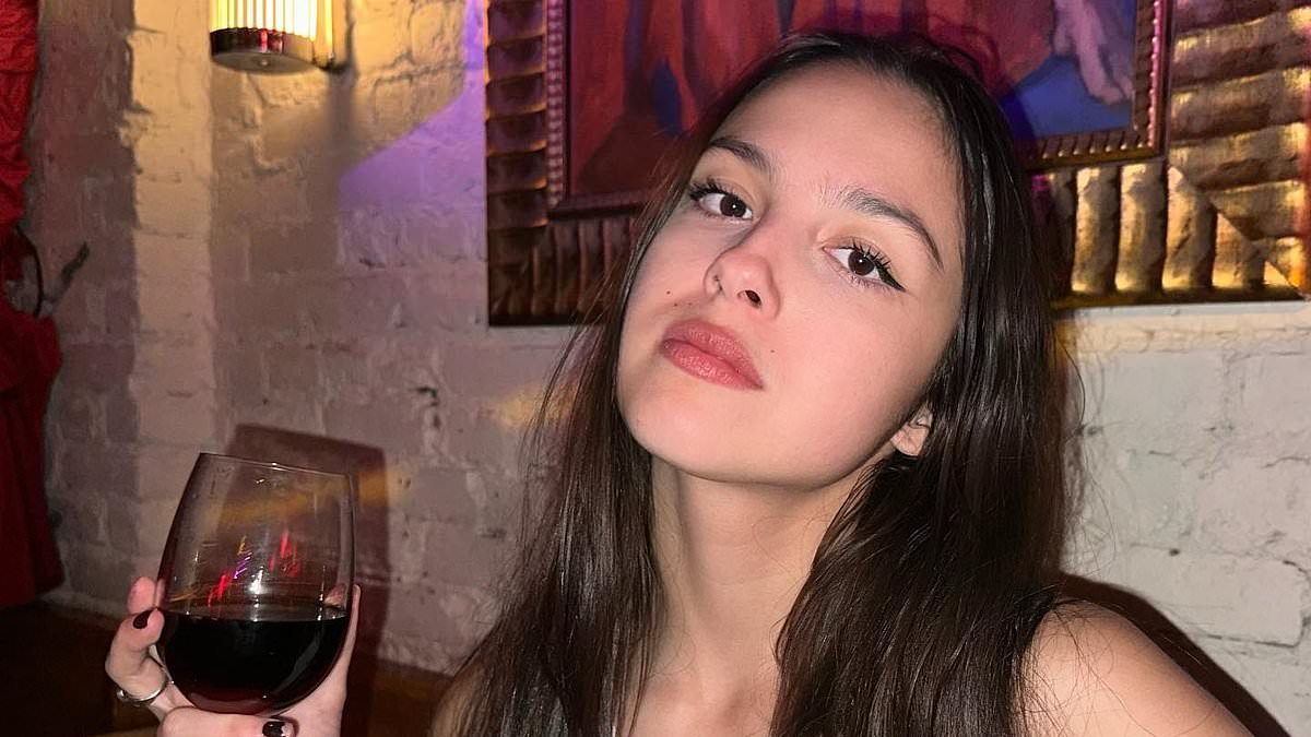 alert-–-olivia-rodrigo-shares-a-behind-the-scenes-look-from-her-guts-world-tour-as-she-cuts-loose-with-a-glass-of-wine