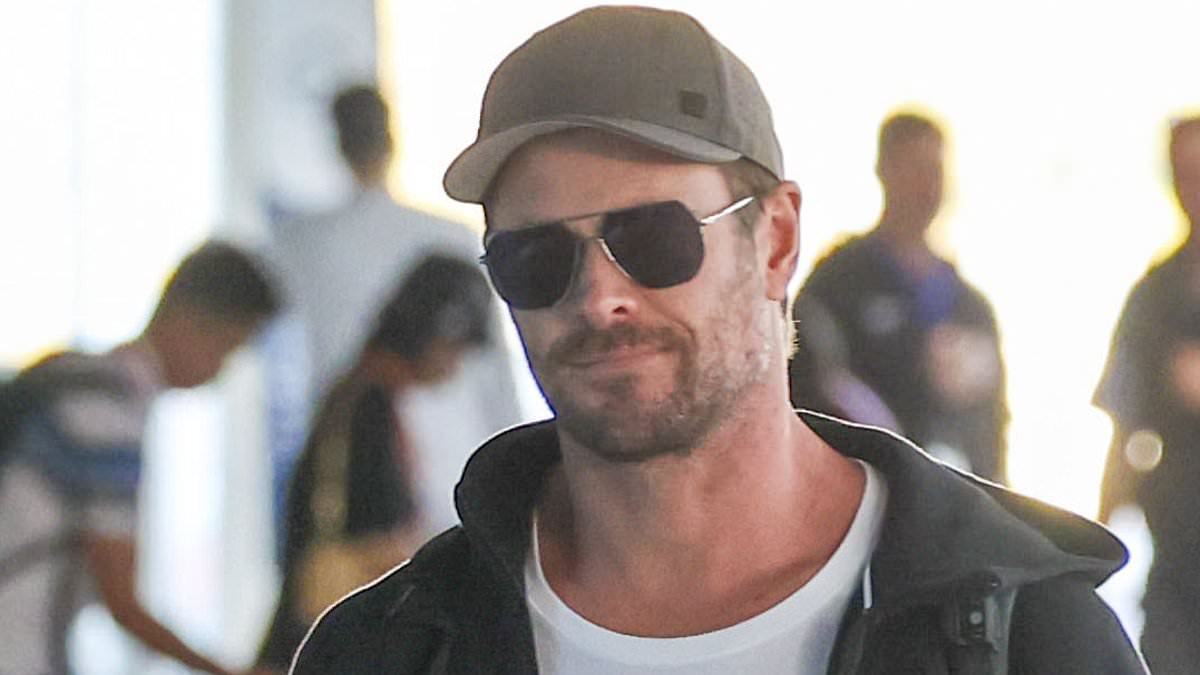 alert-–-chris-hemsworth-keeps-a-low-profile-in-dark-sunglasses-as-he-jets-out-of-sydney-on-anzac-day-ahead-of-media-blitz-to-promote-mad-max-furiosa