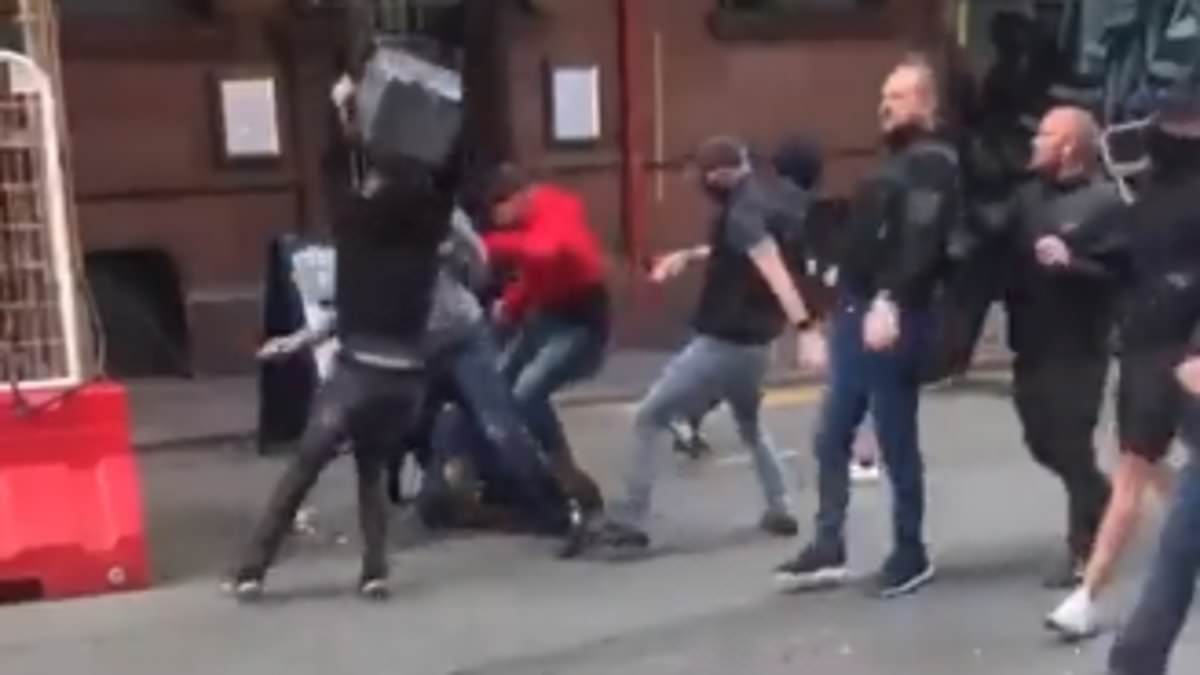 alert-–-football-hooligans-who-brought-‘terror’-to-streets-as-they-battled-with-chairs,-bins-and-flares-ahead-of-manchester-united-v-leeds-game-are-banned-from-matches