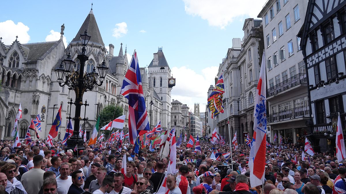 alert-–-thousands-fill-central-london-for-tommy-robinson-rally-amid-chants-of-‘we-want-our-country-back’-as-met-police-flood-streets-with-1,000-officers-to-keep-the-peace-as-capital-with-anti-racism-counter-protest-and-trans-pride-event-also-due