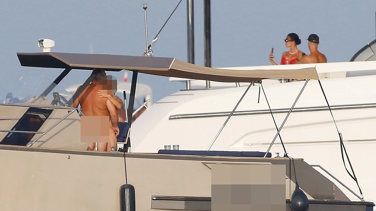 alert-–-what’s-happening-below-deck?-cristiano-ronaldo-appears-to-miss-the-real-action-as-naked-couple-sail-by-his superyacht-amid-holiday-with-georgina-rodriguez