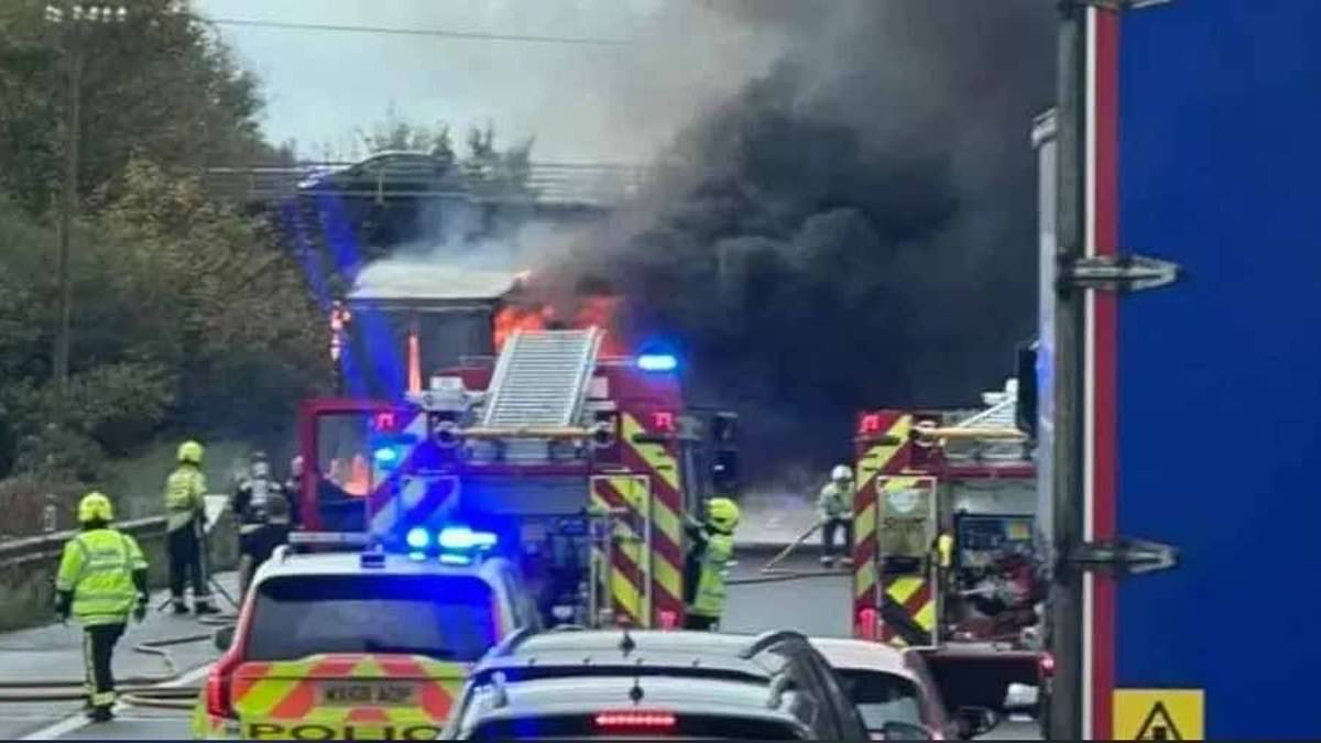 alert-–-half-term-getaways-are-plunged-into-chaos-as-m5-closes:-drivers-stuck-in-five-hour-queue-resort-to-playing-football-to-pass-the-time-after-huge-lorry-blaze