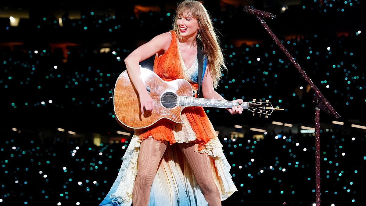 alert-–-taylor-swift-unveils-new-koi-fish-inspired-dress-during-surprise-song-set-at-new-orleans eras-tour-stop