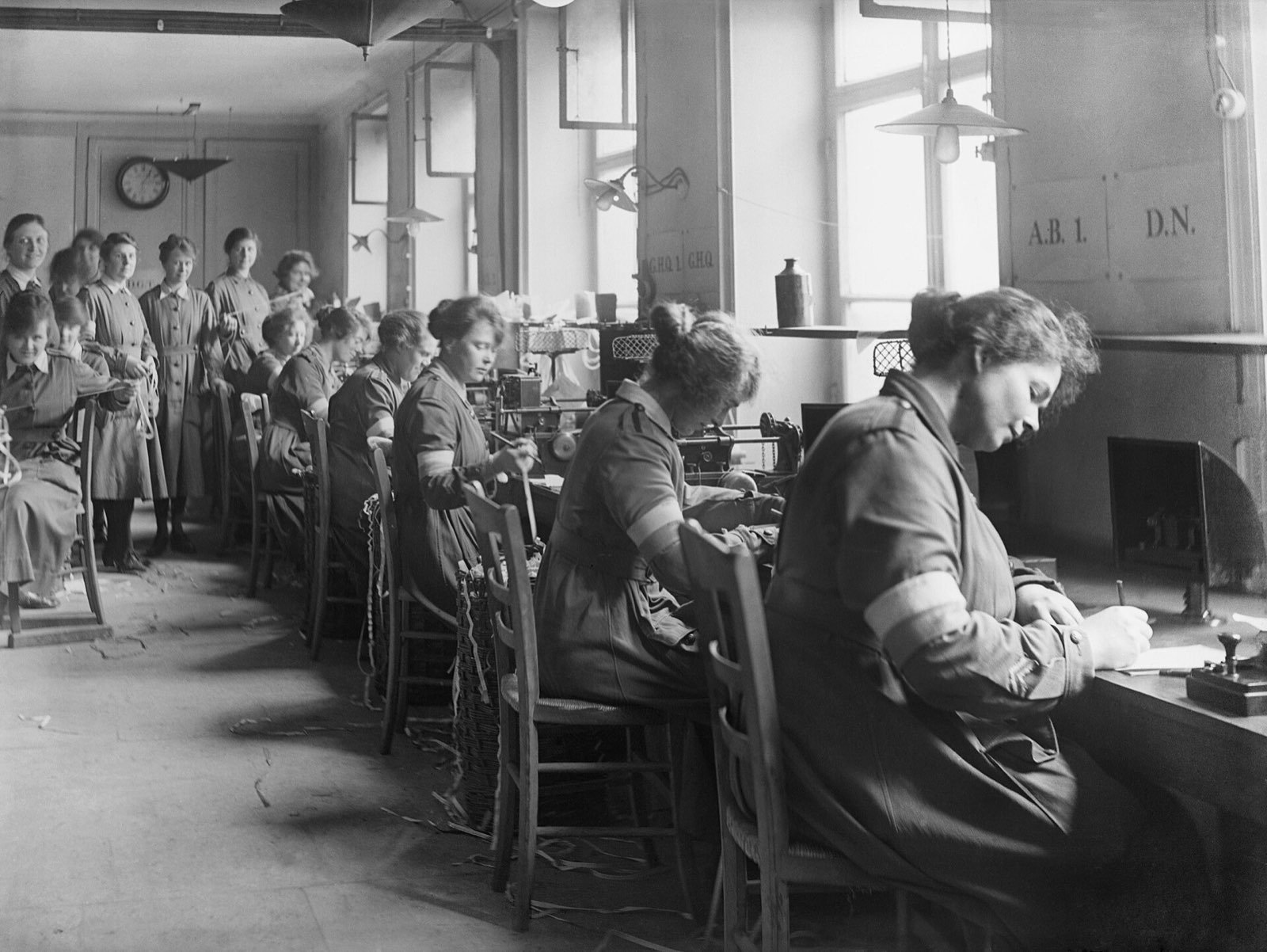 Telegraphists at a long desk in the Signals Office at Boulogne, 1919
