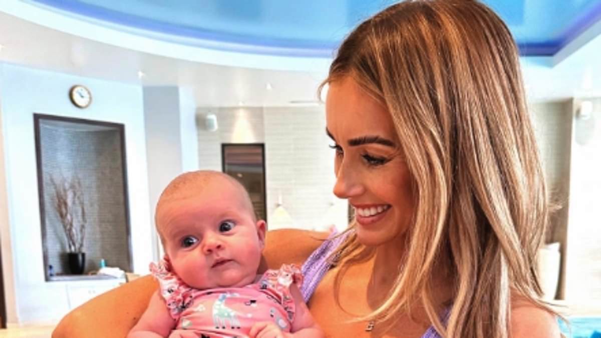 alert-–-new-mum-laura-anderson-showcases-her-gorgeous-post-partum-figure-in-a-cut-out-bather-as-she-takes-baby-daughter-bonnie-for-her-first-swim