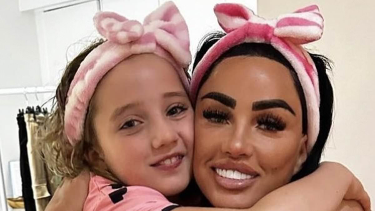 alert-–-katie-price-and-daughter-bunny,-9,-twin-in-matching-pink-satin-pyjamas-and-headbands-as-they-enjoy-a-half-term-movie-night