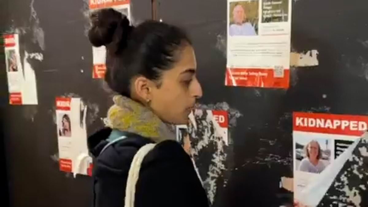 alert-–-palestine-supporters-tear-down-more-posters-of-israeli-women-and-children-kidnapped-by-hamas-terrorists-in-london’s-leicester-square-–-with-one-smiling-to-camera-as-he-walks-off
