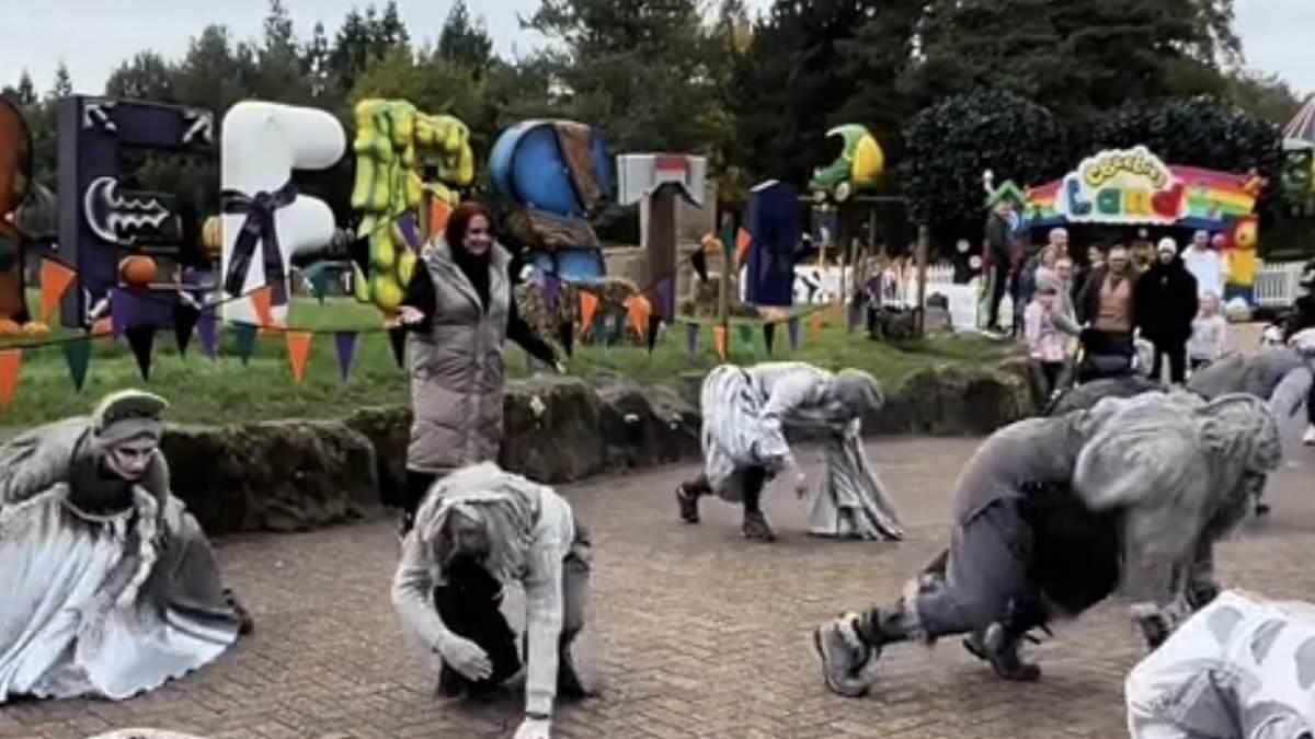 alert-–-hilarious-moment-alton-towers-visitor-steals-the-show-by-dancing-with-scare-fest-flash-mob-at-theme-park-after-being-unwittingly-surrounded-by-dancing-zombies-and-joining-in