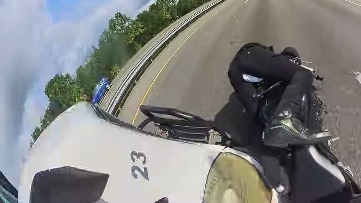 alert-–-crazy-moment-motorcyclist-zips-between-semi-trucks-and-cars-on-a-busy-freeway-–-before-crashing-and-suffering-more-than-20-fractures:-‘thankfully-i-made-it-out-alive-and-didn’t-lose-any-limbs’