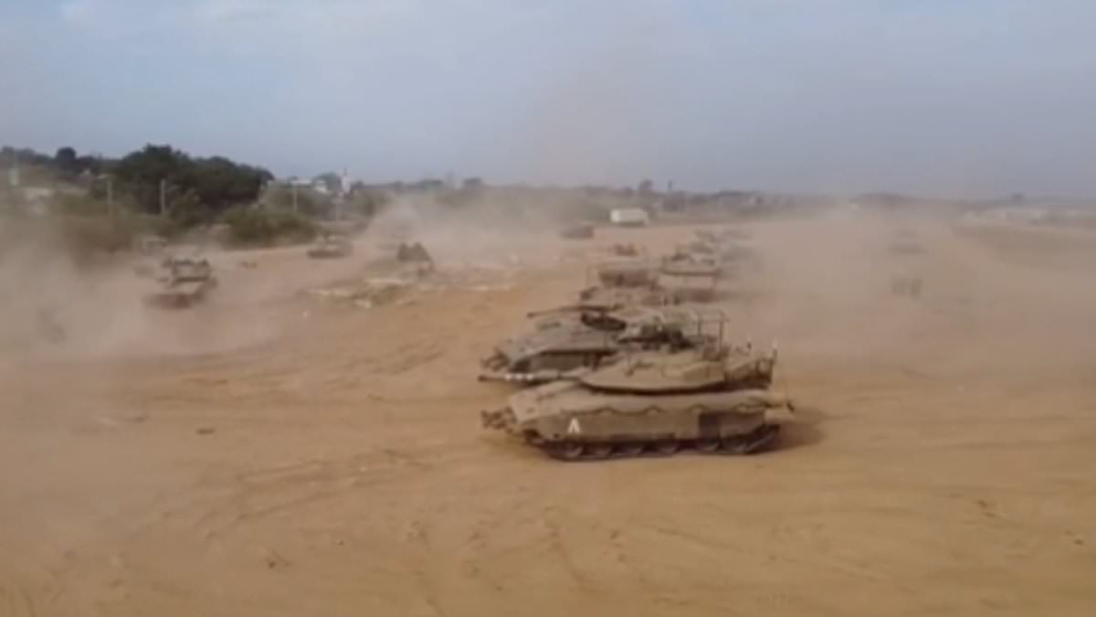 alert-–-israeli-tanks-roll-into-gaza-as-full-ground-invasion-looms:-new-footage-shows-armoured-units-inside-enclave-after-it-was-pounded-in-night-of-strikes-that-‘killed-terror-attack-mastermind’-and-destroyed-150-underground-bases