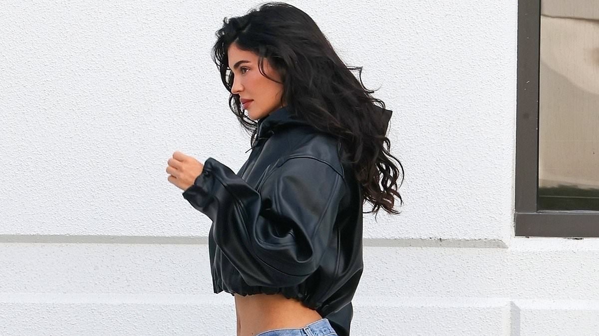 alert-–-exclusive:-kylie-jenner-shows-off-her-very-slim-waist-in-faded-jeans-and-leather-jacket…-after-girls’-night-with-sister-kendall-and-hailey-bieber