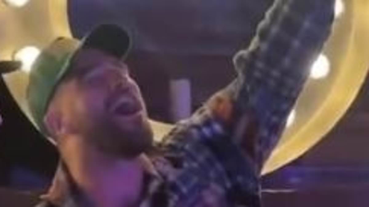 alert-–-travis-kelce-dances-to-taylor-swift-classic-‘love-story’-in-texas-bar-and-sends-the-swifties-wild-with-viral-video-after-watching-the-rangers-win-their-world-series-game
