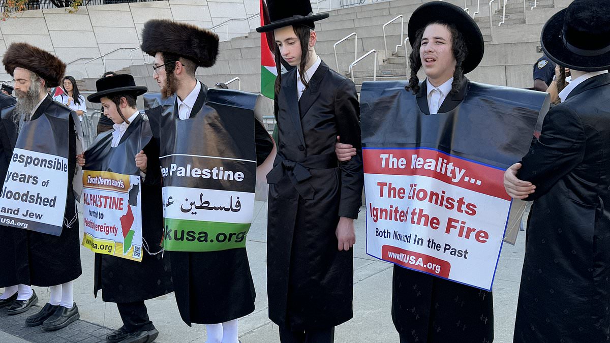 alert-–-thousands-of-pro-palestine-protestors-shut-down-brooklyn-bridge-after-flooding-nyc-streets-alongside-orthodox-jewish-members-to-condemn-israel’s-war-in-gaza-–-as-businesses-are-plastered-with-‘zionism-is-terrorism’-stickers