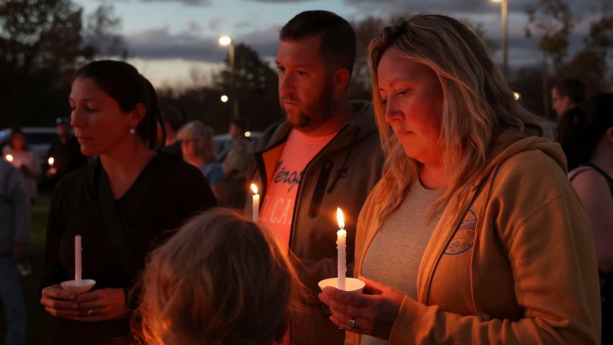 alert-–-hundreds-of-mourners-gather-to-remember-victims-of-maine-mass-shooting-at-candlelit-vigil-which-included-prayer-for-family-of-gunman-robert-card-who-opened-fire-on-sleepy-town-slaughtering-18