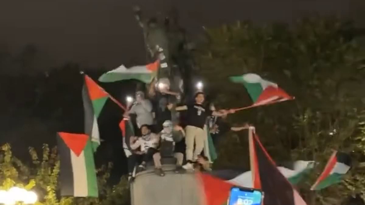alert-–-fury-on-streets-of-nyc:-pro-palestine-protestors-storm-union-square-and-climb-on-george-washington-statue-chanting-‘long-live-hamas’-–-after-shutting-down-brooklyn-bridge-and-plastering-stickers-over-starbucks-saying-‘zionists-are-terrorists’