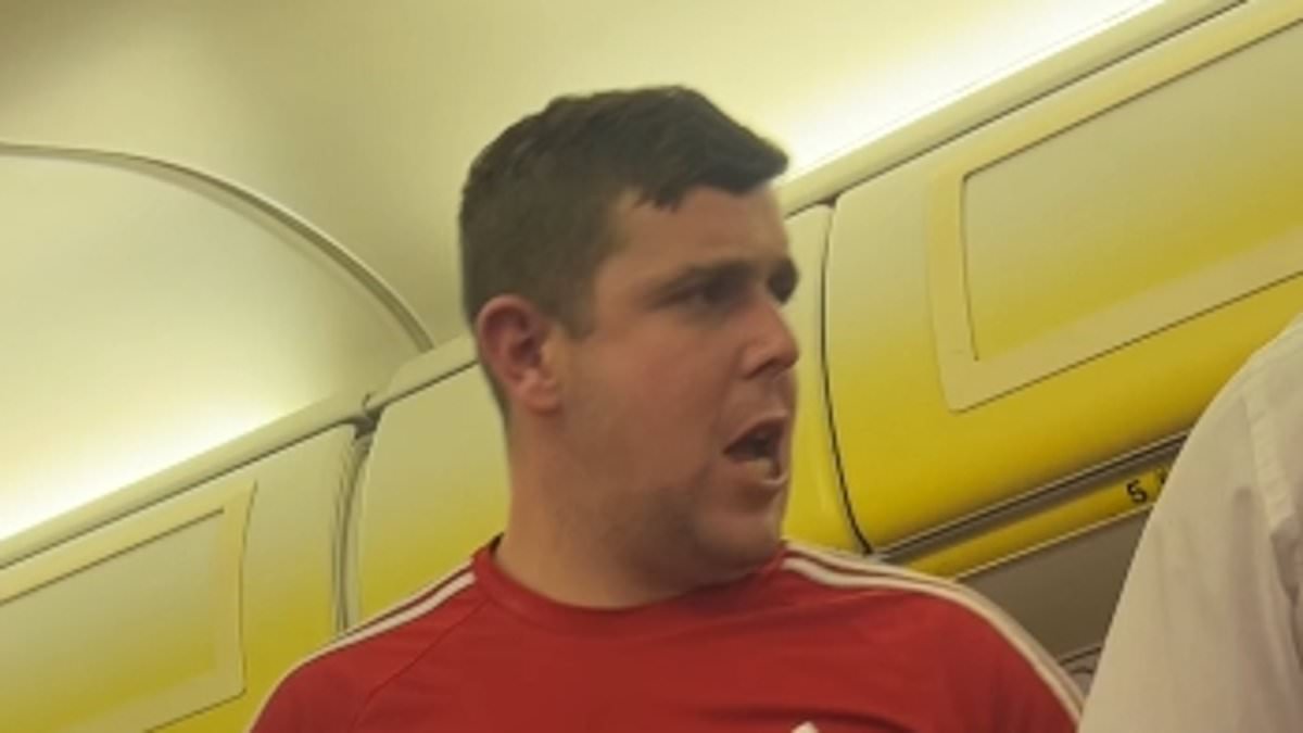 alert-–-exclusive:-terrifying-moment-drunken-ryanair-passenger-grapples-with-cabin-crew-‘after-he-bought-a-litre-of-jagermeister’-before-take-off-as-manchester-flight-to-dublin-is-delayed-by-almost-five-hours
