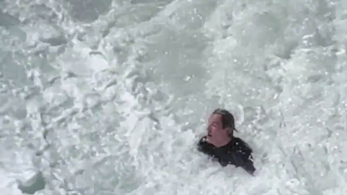 alert-–-terrifying-moment-at-sydney’s-tamarama-beach-as-a-surfer-is-pummelled-by-huge-waves-before-bondi-rescue-lifeguard-luke-faddy-jumps-in-to-help-him