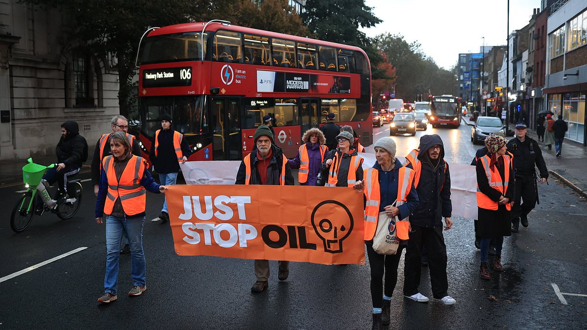 alert-–-just-stop-oil-deploy-latest-‘die-in’-tactic-as-they-bring-chaos-to-the-streets-of-east-london-during-rush-hour-slow-march-–-as-furious-motorists-are-left-in-long-tailbacks