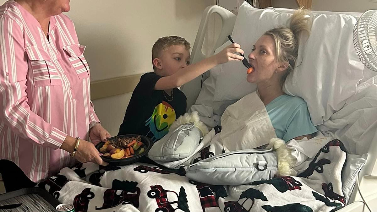 alert-–-quadruple-amputee-kentucky-nurse-shows-her-missing-legs-for-the-first-time-after-she-woke-up-from-routine-kidney-stone-surgery-to-find-all-four-limbs-removed-–-as-she-shares-heartwarming-photo-of-her-young-son-tenderly-feeding-her-in-hospital-bed