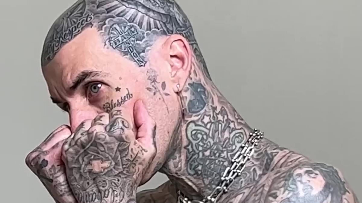 alert-–-travis-barker-gets-new-tattoo-on-his-head…-as-the-blink-182-drummer-opts-to-get-cherub-with-a-cross-inked:-‘how-does-he-even-any-have-room-left?’