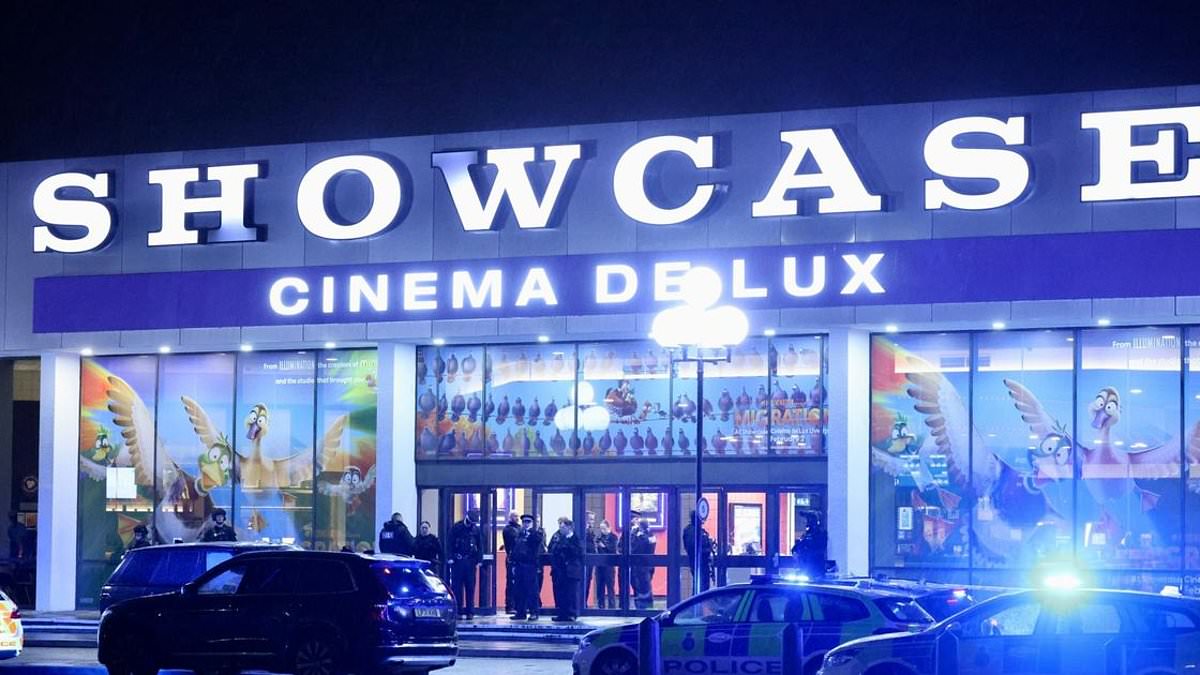 alert-–-cinema-goes-into-lockdown-amid-fears-gunman-is-‘on-the-loose’:-armed-police-escort-terrified-families-watching-films-back-to-cars-after-shots-fired-at-nearby-business-–-as-police-say-no-one-has-been-injured-‘at-this-stage’