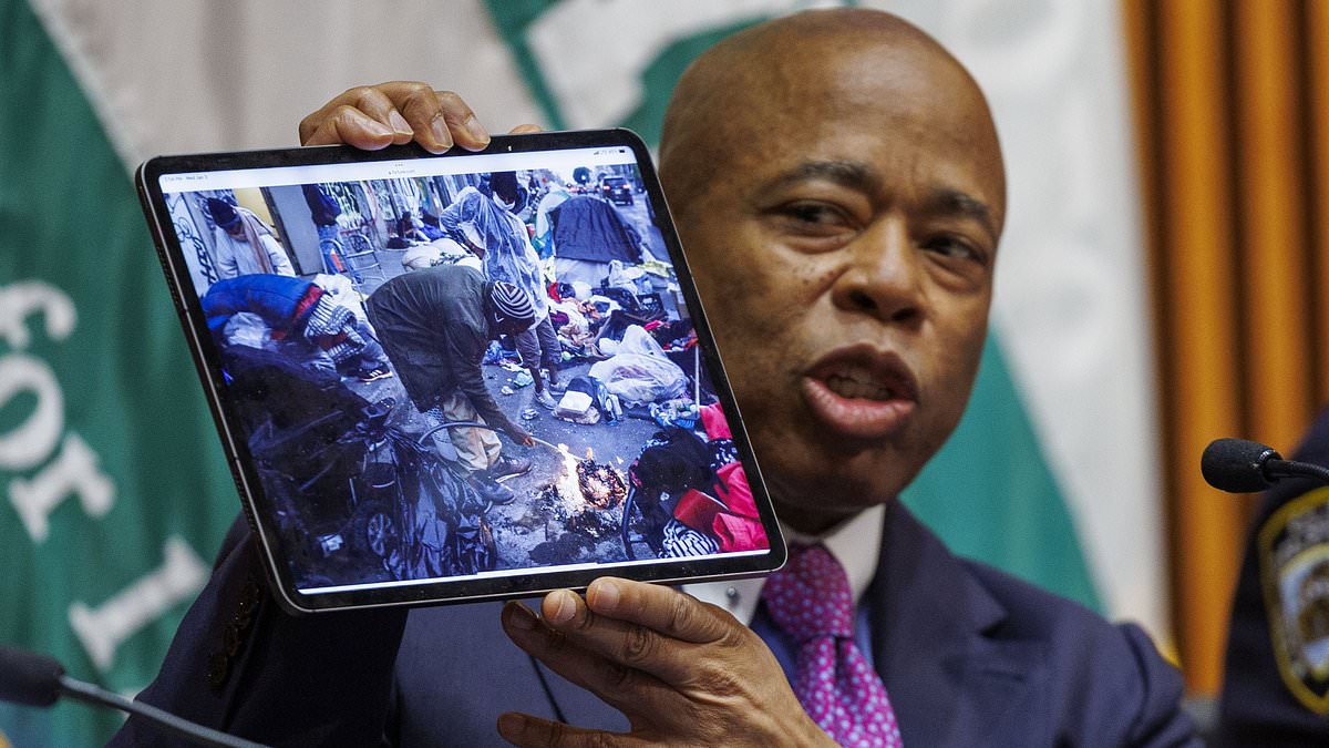 alert-–-astonishing-moment-big-apple-mayor-holds-up-a-picture-of-la’s-skid-row-neighborhood-and-says-‘you-don’t-see-this-in-nyc’-–-as-city-reels-under-migrant-crisis,-violent-crime-and-lawlessness