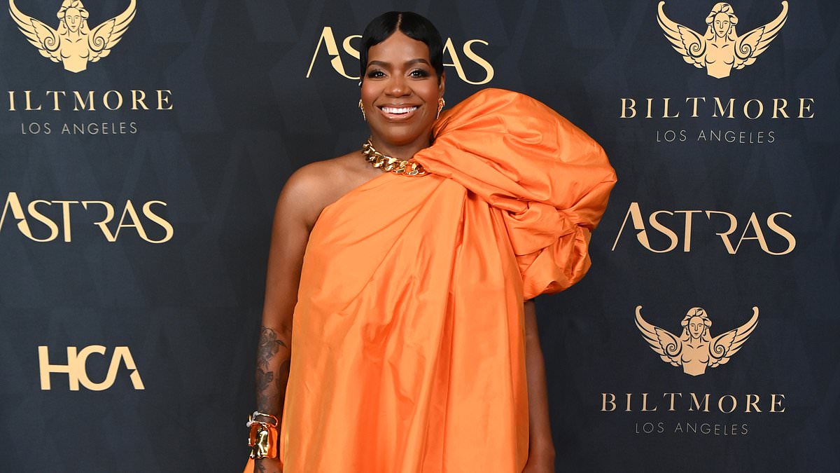 alert-–-fantasia-barrino-wows-in-billowing-orange-gown-as-she-joins-stars-at-the-7th-astra-film-awards-in-la