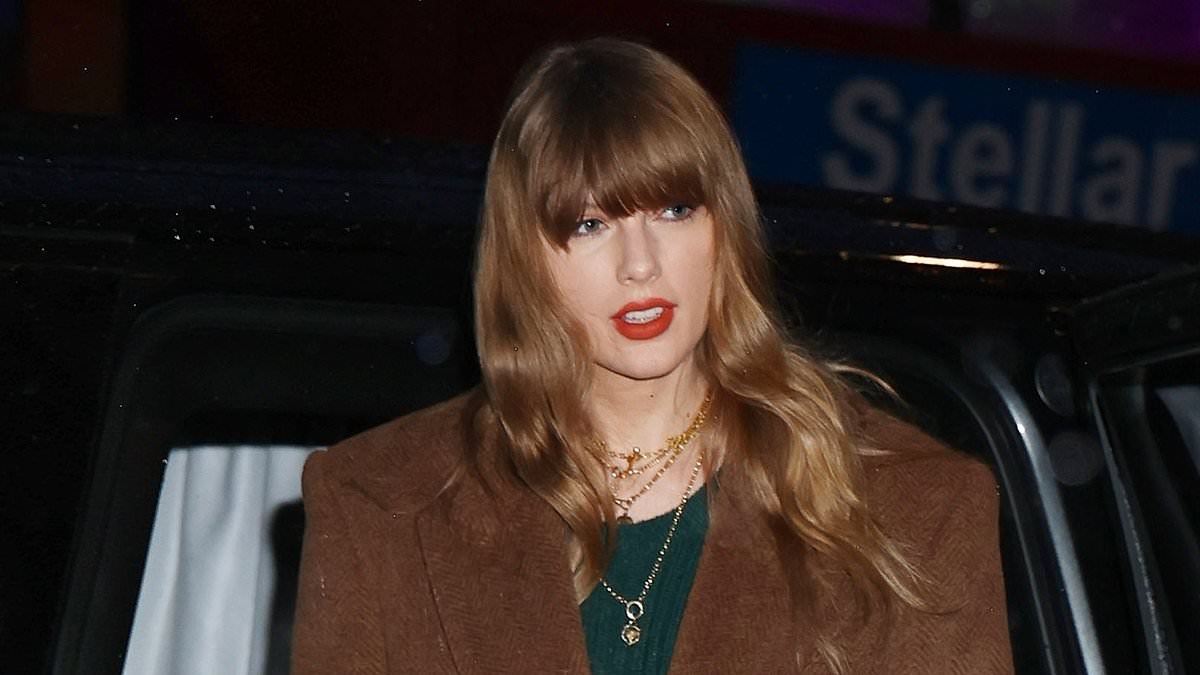 alert-–-taylor-swift-shakes-off-the-rain-in-a-green-sweater-dress-and-chic-brown-coat-and-heads-to-the-recording-studio-as-storm-batters-nyc