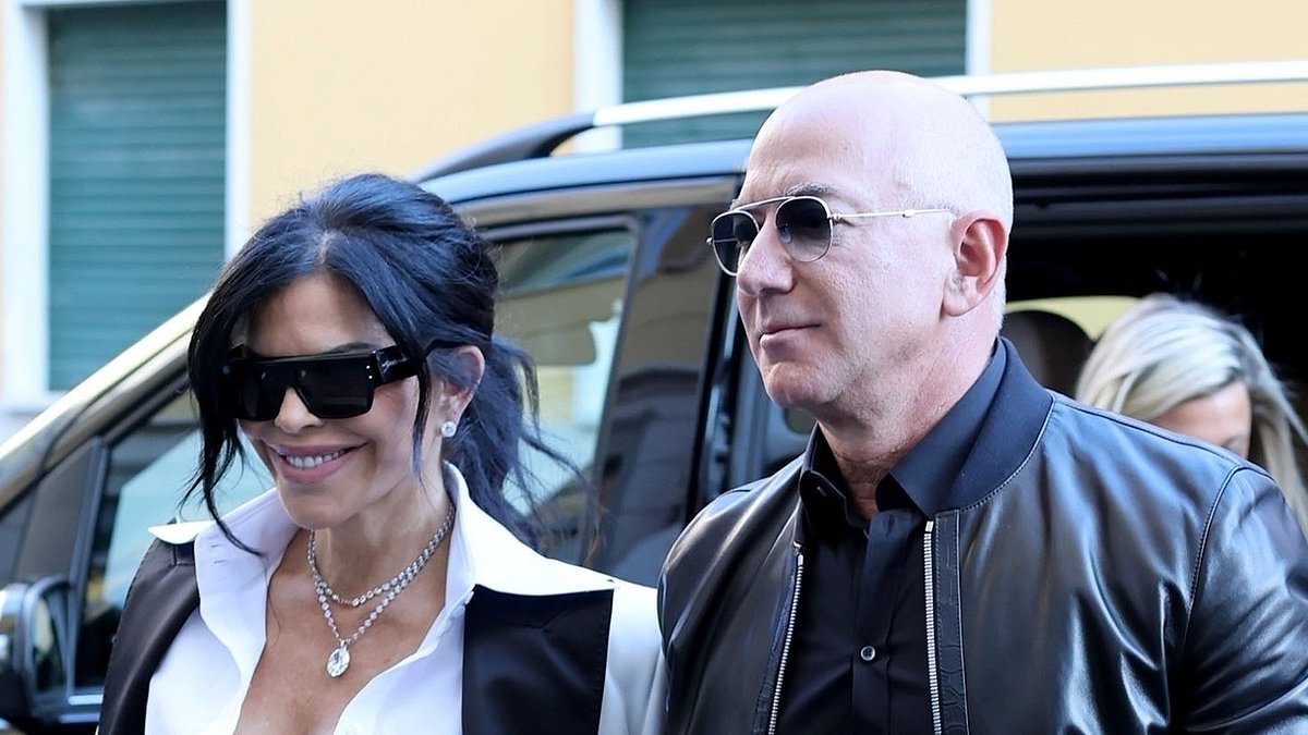 alert-–-lauren-sanchez-puts-on-a-very-busty-display-as-she-arrives-hand-in-hand-with-her-amazon-billionaire-fiance-jeff-bezos-for-the-dolce-&-gabbana-show-at-milan-fashion-week