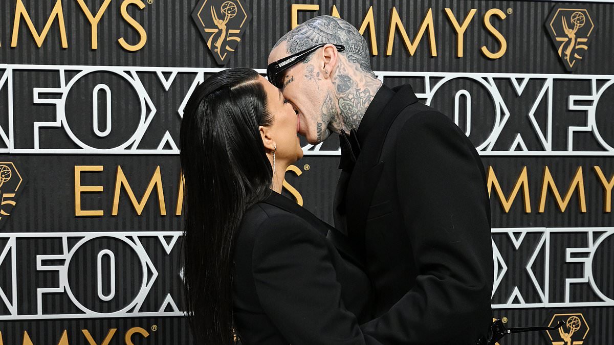 alert-–-kourtney-kardashian-and-travis-barker-share-a-passionate-kiss-at-the-emmy-awards-as-she-attends-first-public-event-since-welcoming-baby-rocky