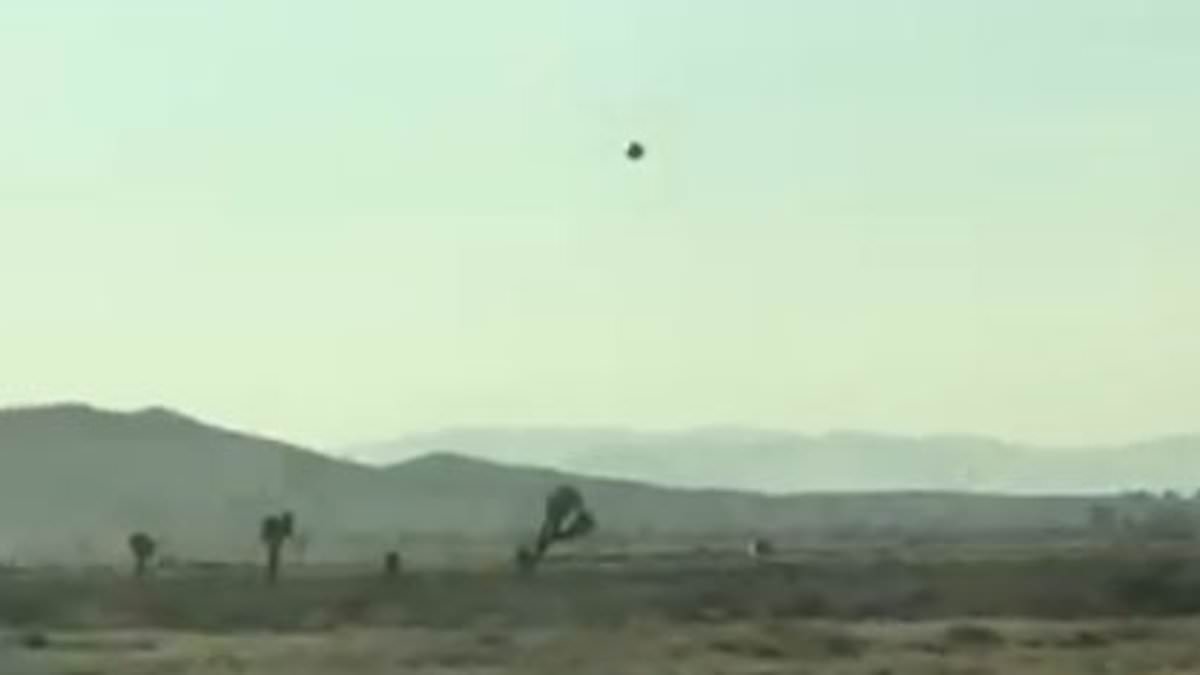 alert-–-video-shows-mysterious-‘black-glass’-ufo-floating-in-sky-near-airfield-used-by-military-contractor-general-atomic-in-el-mirage,-california