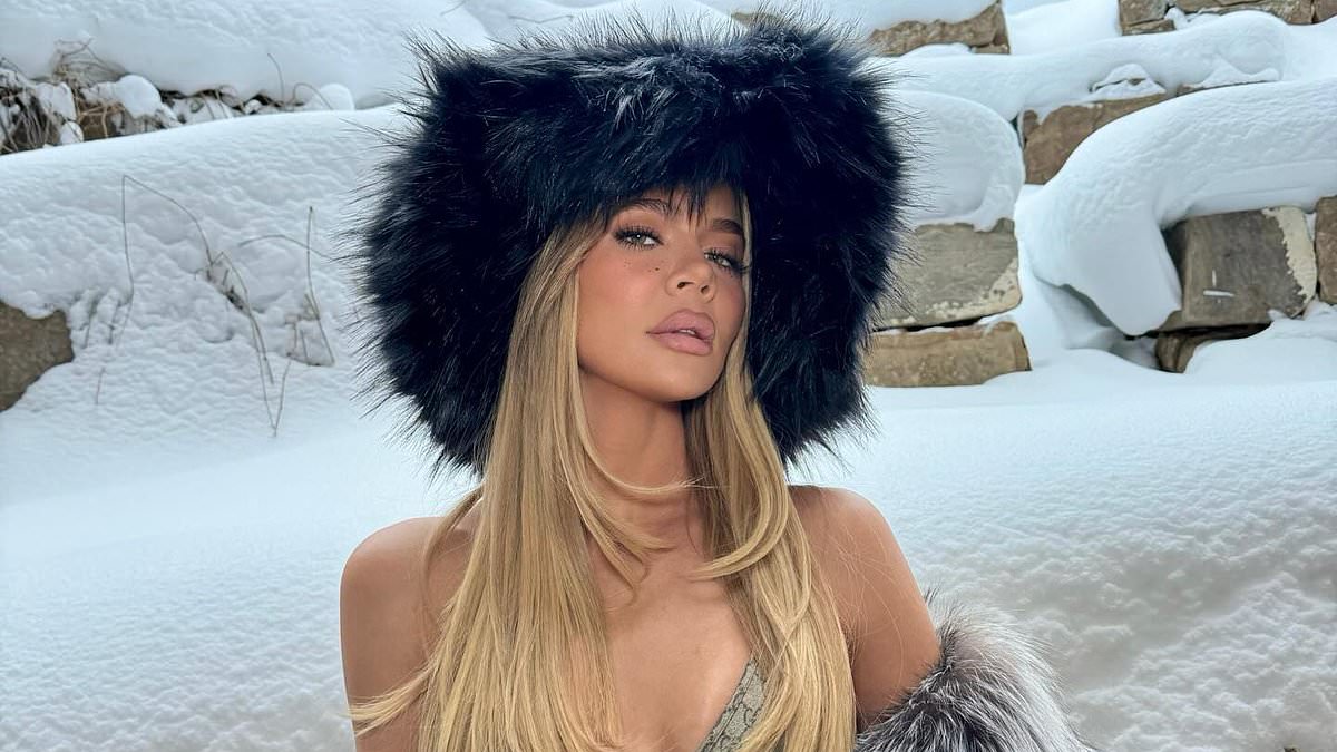 alert-–-khloe-kardashian-channels-her-inner-‘mob-wife’-in-tiny-gucci-bikini-and-faux-fur-coat-and-hat-as-she-strikes-a-sizzling-pose-in-the-snow