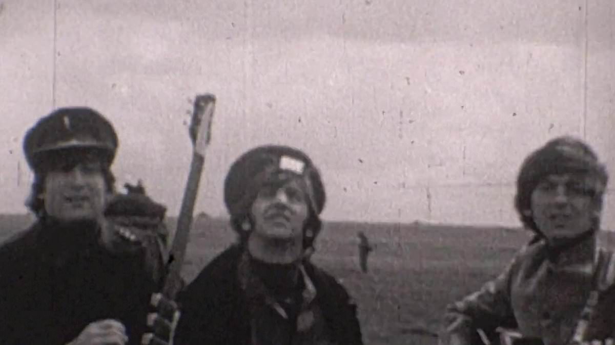 alert-–-john-lennon-clowns-around-with-ringo,-paul-and-george-as-the-beatles-film-on-salisbury-plain-in-never-before-seen-images-that-‘capture-the-sheer-joy-of-the-fab-four’-as-they-made-1965-film-help!