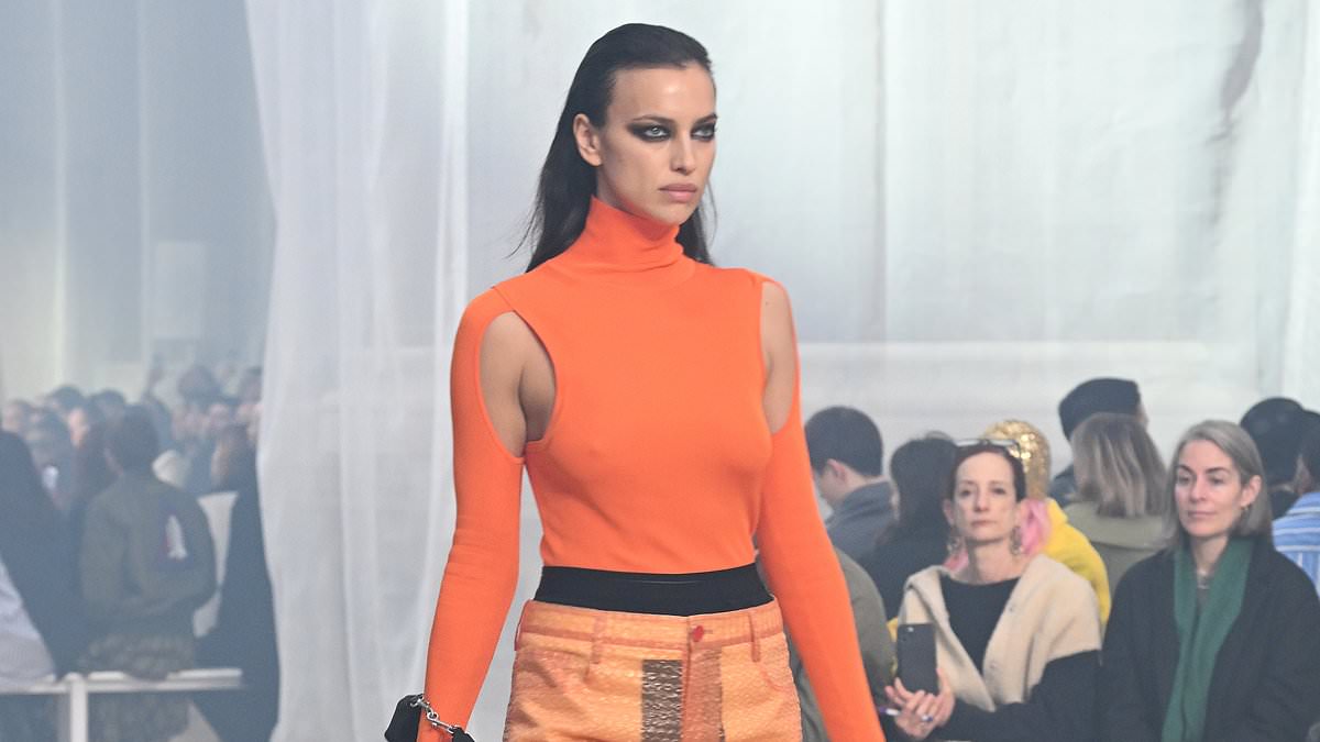 alert-–-irina-shayk-wows-in-cut-out-orange-top-and-bold-smoky-eye-make-up-as-she-rules-the-runway-for-helmut-lang-at-star-studded-new-york-fashion-week