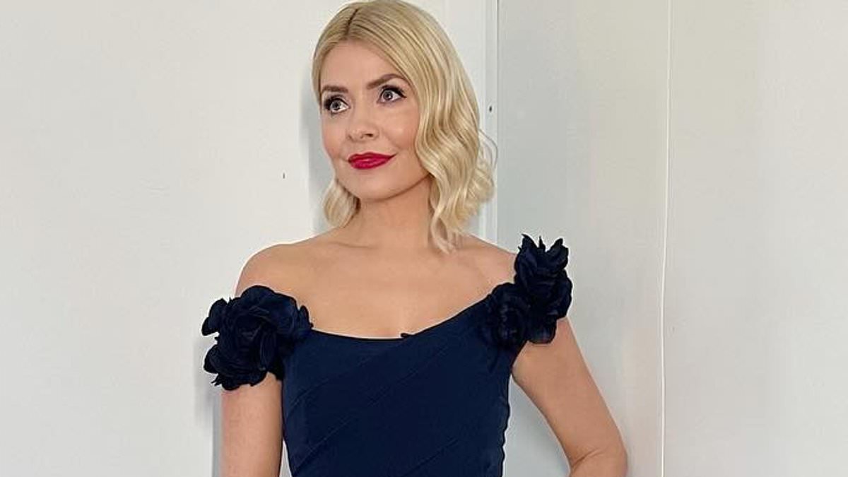 alert-–-dancing-on-ice’s-holly-willoughby-looks-sensational-in-a-black-couture-off-shoulder-stretch-crepe-gown-with-flower-detail-for-musicals-week
