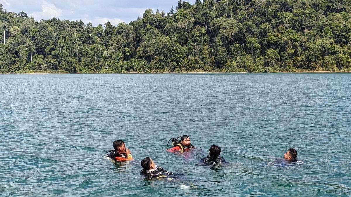 alert-–-british-tourist-missing-after-falling-into-reservoir-in-thailand-while-kayaking:-scuba-divers-search-160ft-deep-waters-after-friend-raises-alarm