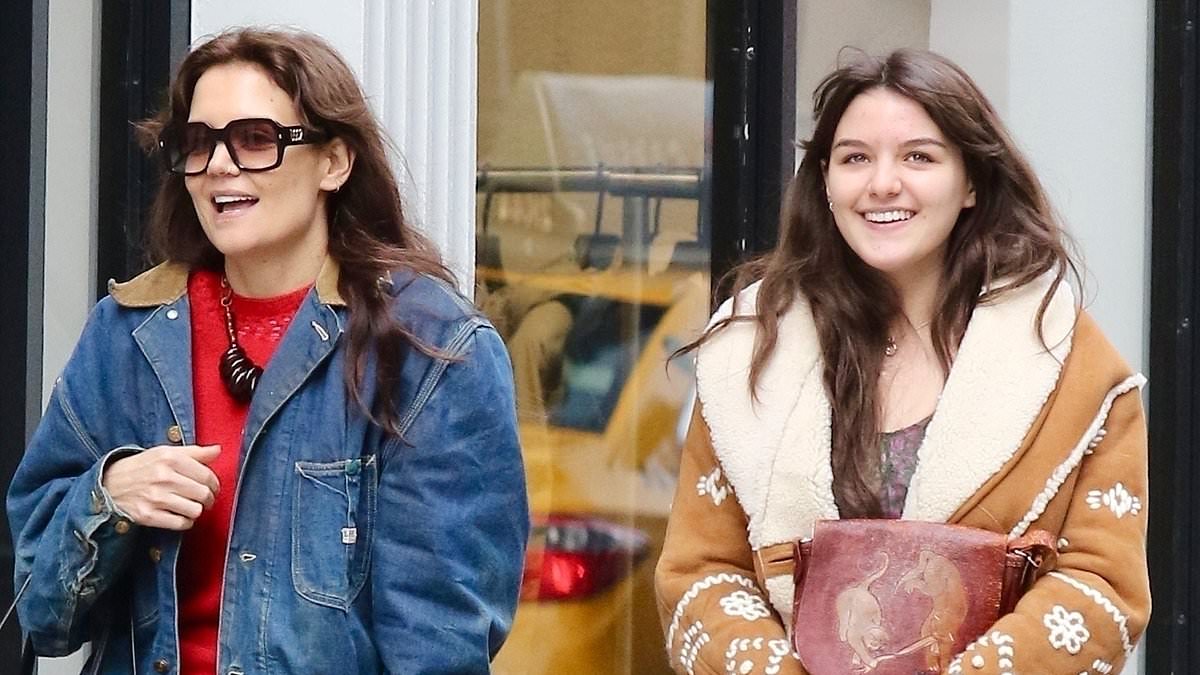 alert-–-katie-holmes,-45,-and-daughter-suri-cruise,-17,-look-like-sisters-as-they-flash-matching-smiles-and-denim-looks-while-out-for-stroll-in-new-york-city