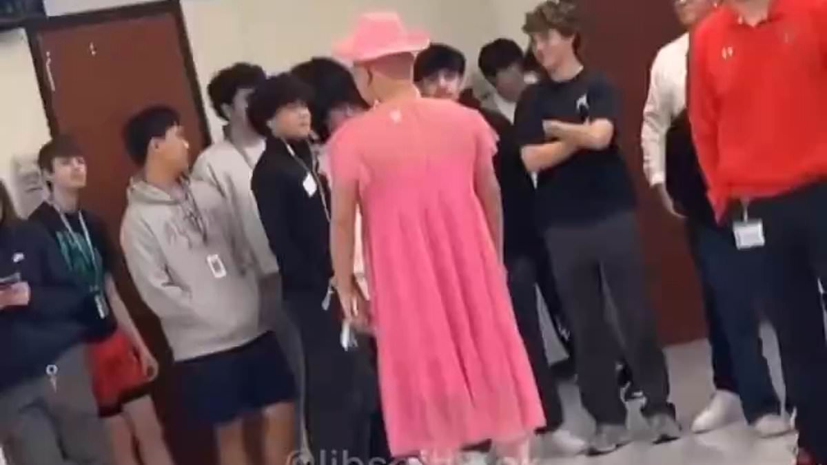 alert-–-crossdressing-teacher-is-placed-on-leave-after-outrage-over-video-showing-him-at-school-wearing-pink-dress-and-cowgirl-hat